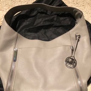 Cute Michael Kors Leather hobo bag with silver accessories